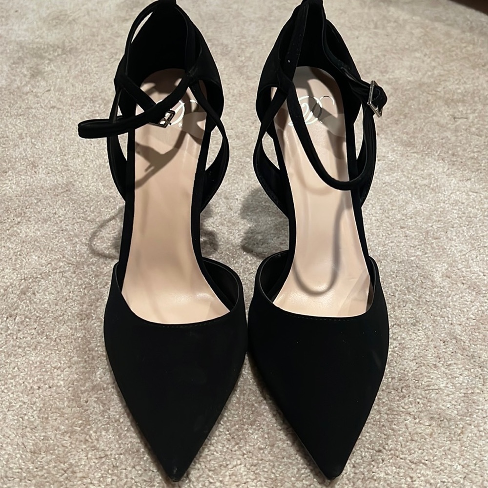Black 4 inch heels never worn.